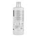 A 1-liter bottle of Urnex Dezcal coffee equipment liquid scale remover.