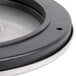 A round black and silver InSinkErator sink flange mounting assembly.