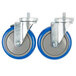 A pair of blue and silver Advance Tabco casters with wheels.