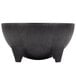 A black Polypropylene Grandote Molcajete with legs.
