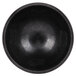 A black polypropylene molcajete bowl with a circular center.