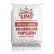 A white bag of Carnival King extra large mushroom popcorn kernels with red text.