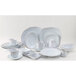 A group of white Tuxton rectangular china trays.