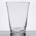 An Arcoroc clear glass on a table.