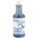 A plastic bottle of clear liquid with a white and blue label that reads "Noble Chemical Klearly Koffee" on a counter.