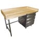A wood workbench with metal drawers.