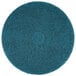 A 3M blue circular floor cleaning pad.