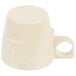 A tan melamine cup with a handle.