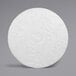 A white circular pad with a circle in the middle.