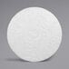 A 3M white circular floor pad with a circle in the middle.