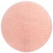A close-up of a pink circle with a circle in the middle