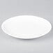 An Arcoroc Candour white porcelain B&B plate with a small rim.