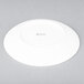 An Arcoroc white porcelain B and B plate with a white rim.