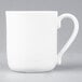 An Arcoroc white porcelain mug with a handle.