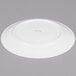A white Chef & Sommelier bone china plate with a rim.
