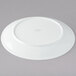 A white Chef & Sommelier bone china plate with a circular rim.