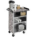 A Lakeside stainless steel beverage service cart with dishes and cups on it.