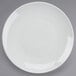 A white Tuxton Florence coupe china plate.