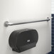 A Lavex 42" restroom grab bar on a white wall.