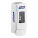 A white Purell hand sanitizer dispenser with a clear window and blue and white logo.