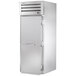 A stainless steel True Spec Series roll-in refrigerator with a solid door.