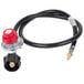 A Backyard Pro gas regulator with a black hose and red connections.