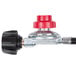 A black plastic and metal gas regulator with a red valve.