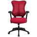 A red office chair with black wheels.