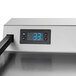 A Beverage-Air stainless steel kegerator with a digital display.