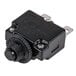 A black plastic overload switch with a black knob.