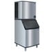 A Manitowoc Indigo NXT remote cooled ice machine with a black lid.