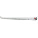 A long white rectangular object with red lights.