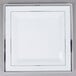 A white plastic square plate with silver trim.