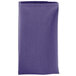 A folded purple Intedge cloth napkin.