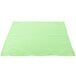 A set of seafoam green cloth napkins on a white background.