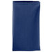 A blue napkin with a white border.