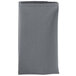 A folded gray Intedge cloth napkin.