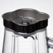 A Waring copolyester blender jar with lid and blade on top.