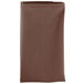 A folded brown Intedge cloth napkin.