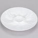 A CAC super white china oyster plate with a flower design.