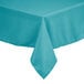 A teal square tablecloth on a table.