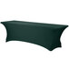 A hunter green Snap Drape Contour Spandex table cover on a long rectangular table.