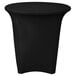 A black Snap Drape spandex table cover on a round table.