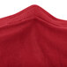 A crimson Snap Drape spandex table cover.