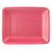 A pink foam tray with a white border and red rim.