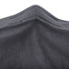 A close up of a gray cloth mask.