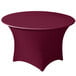 A burgundy Snap Drape spandex table cover on a round table.