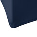 A navy blue Snap Drape spandex table cover on a round table.