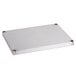An Advance Tabco stainless steel shelf with metal corners.