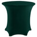 A hunter green Snap Drape spandex table cover on a round table.